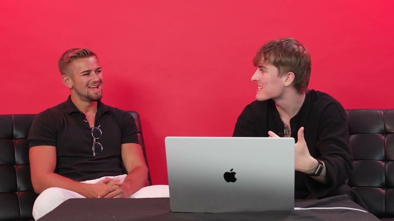 Jake Trinder and a business owner at a laptop during a live YouTube channel consult