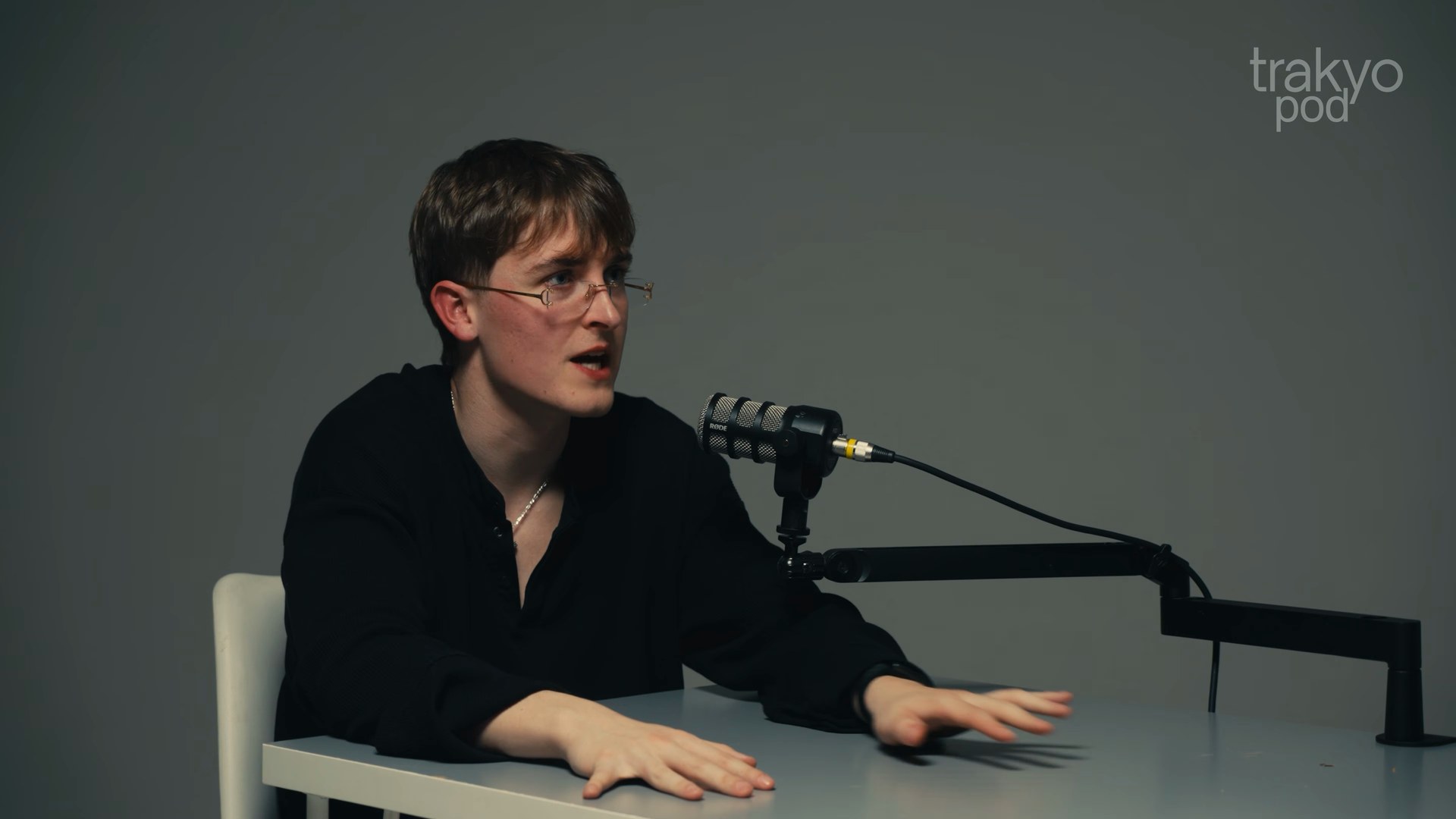 Jake Trinder at the podcast table, talking