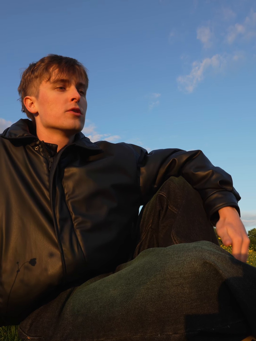 Jake Trinder at his desk above the Newcastle skyline